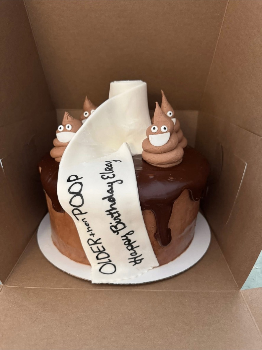 Chocolate drip birthday cake with a hand-lettered fondant banner
